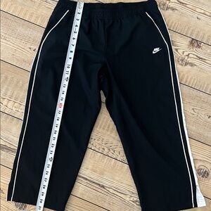 Nike Black Jogger Pants with White Side Piping cropped (short)